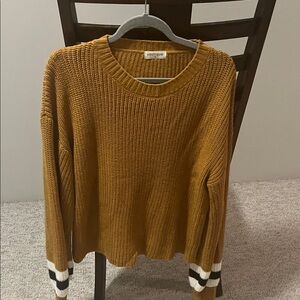 Vestique Mustard Sweater with Black and White Striped Cuffs